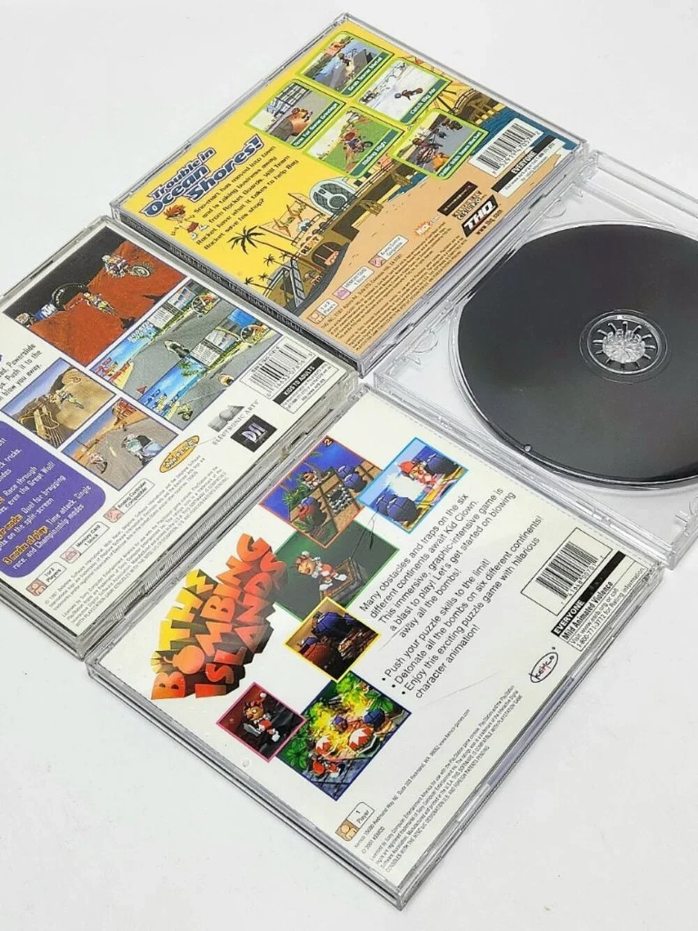 PlayStation PS1 Game Lot Bundle 4x Bombing Islands Team Rocket Rescue Moto Racer